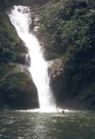 Taking a breather at the bottom of one of many waterfalls in the 'Gorge of the Sacred Waterfalls' onthe Upano